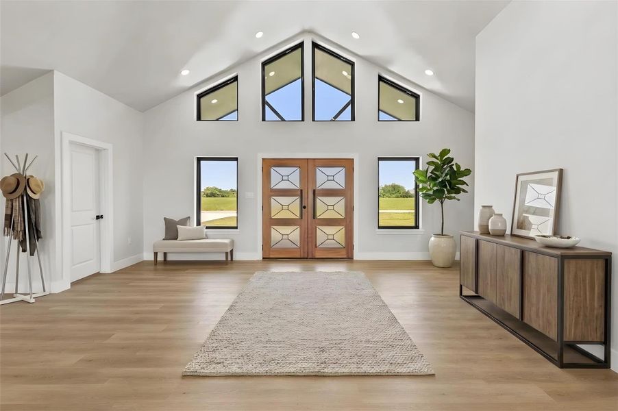 Spacious North facing entry welcomes you inside, while abundant windows fill the home with natural light throughout the day. Virtually staged. Furniture and décor shown are for illustrative purposes only.