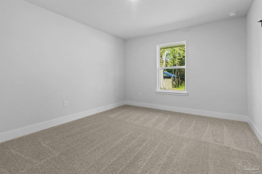 Spacious, unfurnished interior of a new home in Pecan Valley, Cantonment (Image 9).