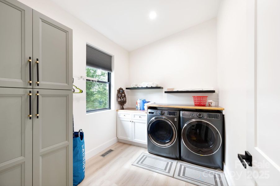 Incredible Upstairs Laundry Room has Built-in Storage