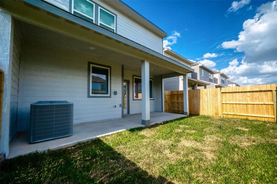 Front exterior of a new home in McClendon Park Village, Houston, TX, highlighting curb appeal (Image 31). Front exterior of a new home in McClendon Park Village, Houston, TX, highlighting curb appeal (Image 31).