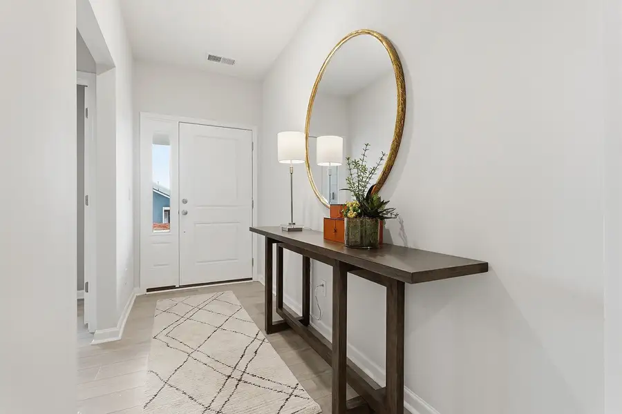 Representative furnished interior of a home built from the Gwinnett II - Genesis Value Collection by Mungo Homes in Hainer Place, Conway (Image 4).