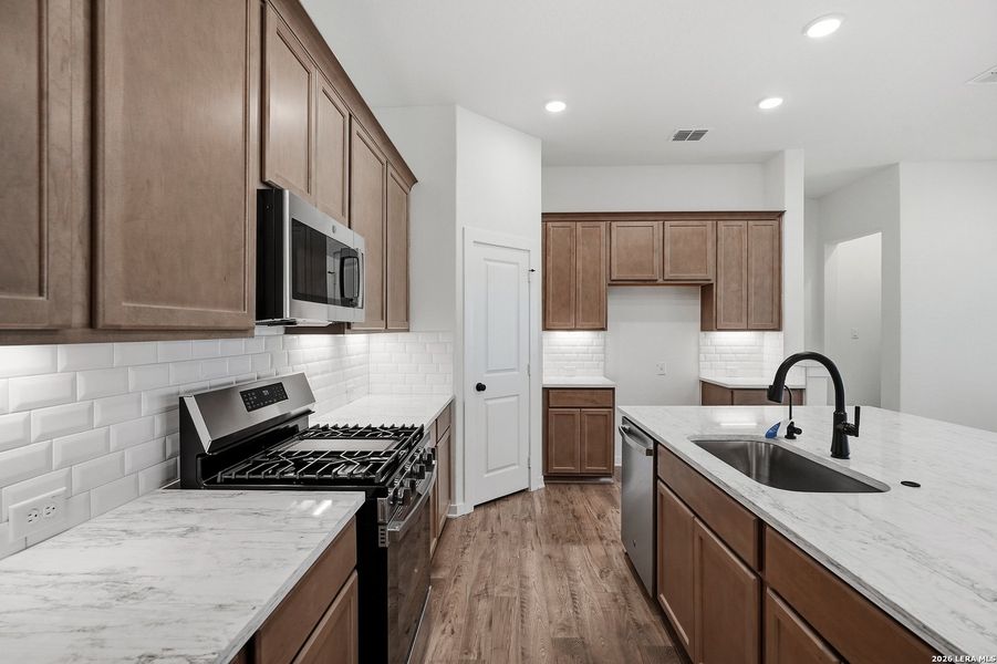 Furnished interior view inside a new home in The Crossvine, Schertz (Image 9).