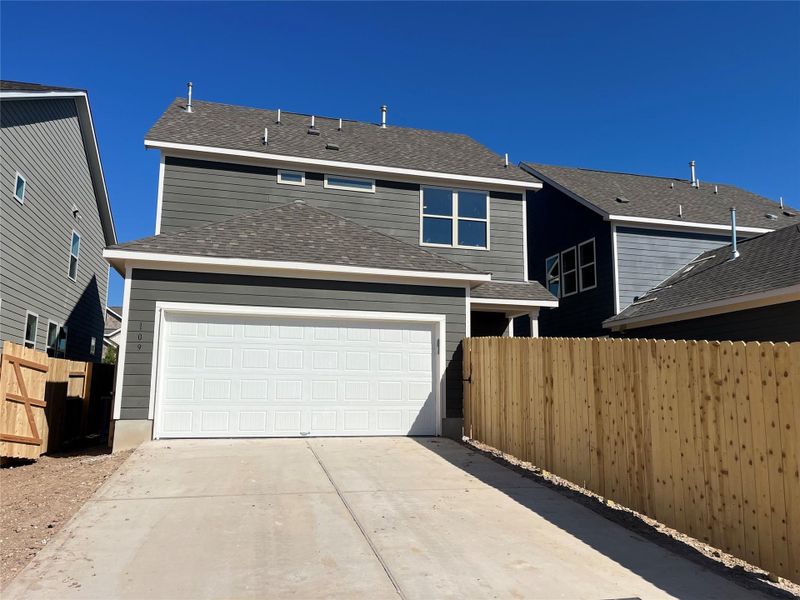 Exterior details and patio area of a home in The Cottages at Lariat, Liberty Hill (Image 24).