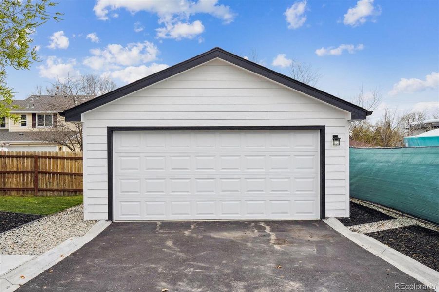 Front exterior of a new home in , Lakewood, CO, highlighting curb appeal (Image 23).