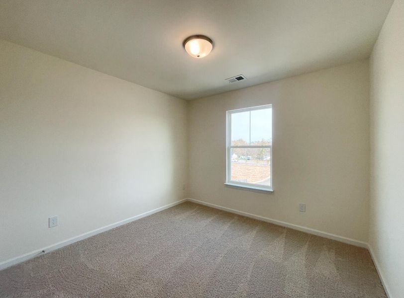 Spacious, unfurnished interior of a new home in Bellevue Townhomes, Greenville (Image 17).