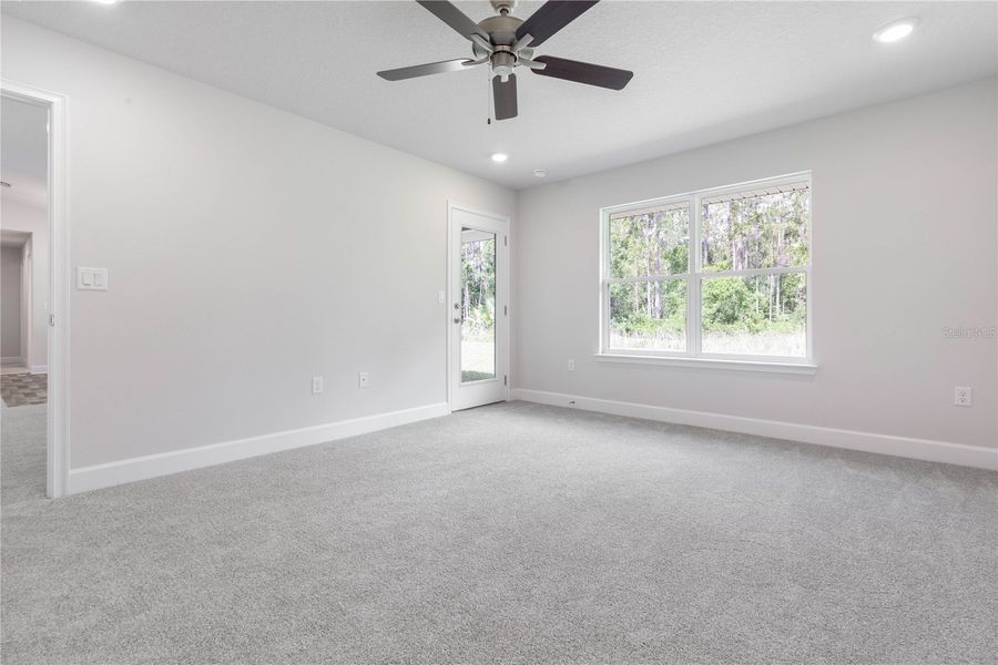 Spacious, unfurnished interior of a new home in Orange Blossom Hills, Summerfield (Image 24).