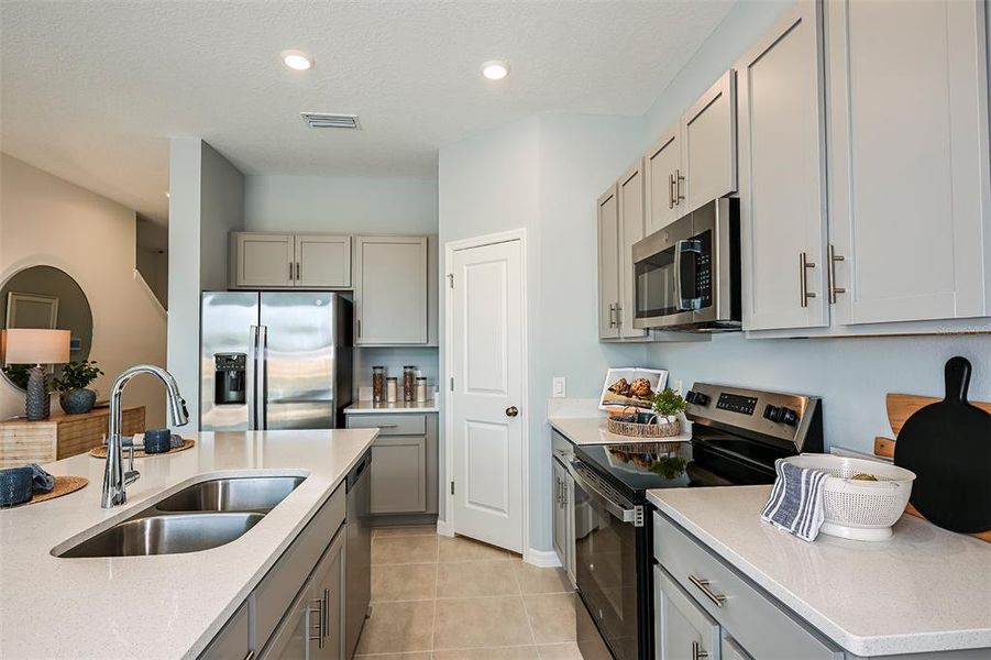 Furnished interior view inside a new home in Waterstone, Groveland (Image 11). Furnished interior view inside a new home in Waterstone, Groveland (Image 11).