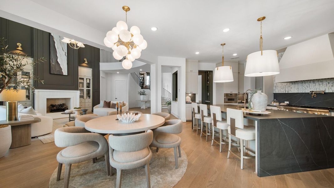 The open floorplan of the Rialto offers space for a breakfast area off the kitchen. Representative photo