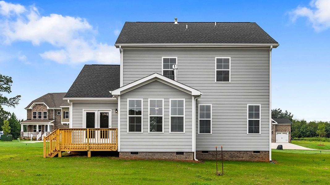 Front exterior of a new home in Lilah Grove, Summerfield, NC, highlighting curb appeal (Image 27).