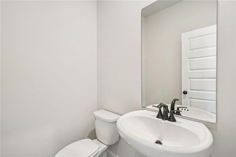 Furnished interior view inside a new home in Martin Springs - Estate Series, Lawrenceville (Image 12).