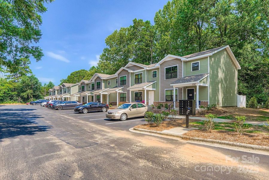 Front exterior of a new home in , Charlotte, NC, highlighting curb appeal (Image 19). Front exterior of a new home in , Charlotte, NC, highlighting curb appeal (Image 19).