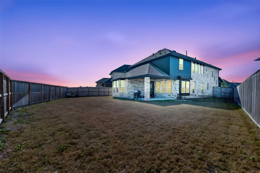 Exterior details and patio area of a home in Harvest Green, Richmond (Image 3). Exterior details and patio area of a home in Harvest Green, Richmond (Image 3).