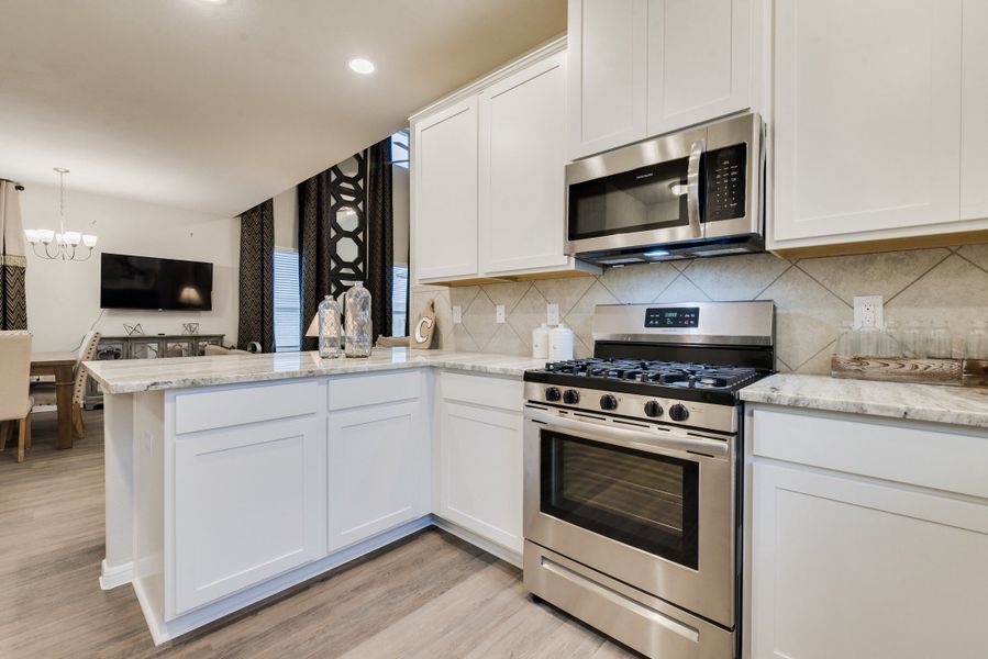 Representative furnished interior of a home built from the Floor Plan 2102 by Colina Homes in Sunterra, Katy (Image 28). Representative furnished interior of a home built from the Floor Plan 2102 by Colina Homes in Sunterra, Katy (Image 28).