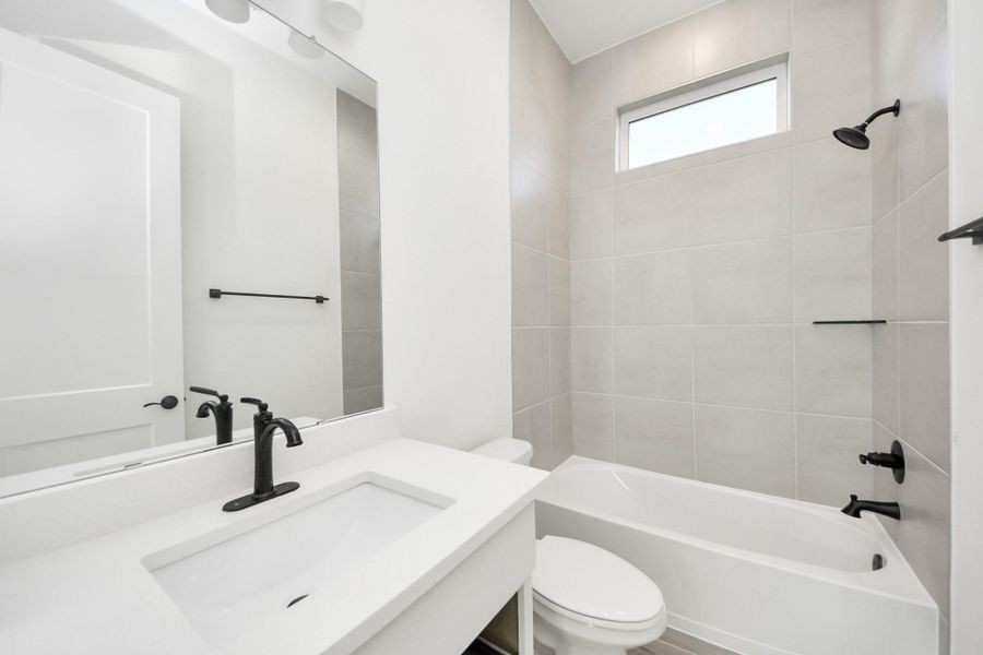 Furnished interior view inside a new home in Meridiana, Manvel (Image 7).