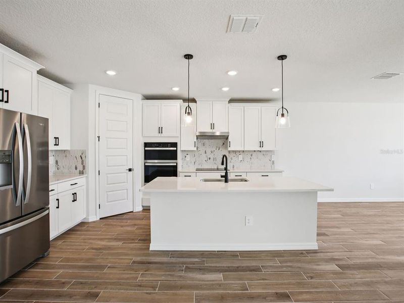 Furnished interior view inside a new home in Two Rivers - Signature Series, Zephyrhills (Image 10). Furnished interior view inside a new home in Two Rivers - Signature Series, Zephyrhills (Image 10).