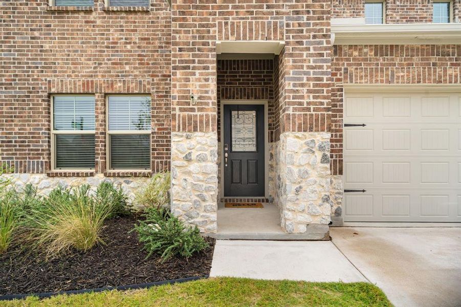 Front exterior of a new home in Northstar, Haslet, TX, highlighting curb appeal (Image 22).