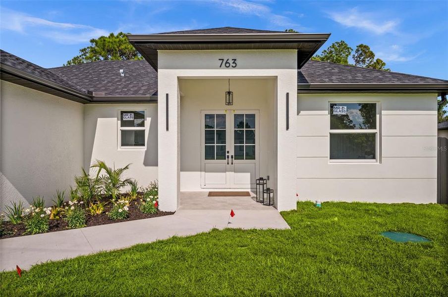 Exterior details and patio area of a home in , Lehigh Acres (Image 3).