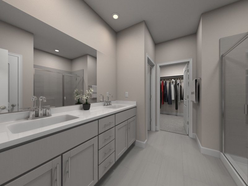 The primary bathroom offers dual vanity sinks and a walk-in shower. The primary bathroom offers dual vanity sinks and a walk-in shower.