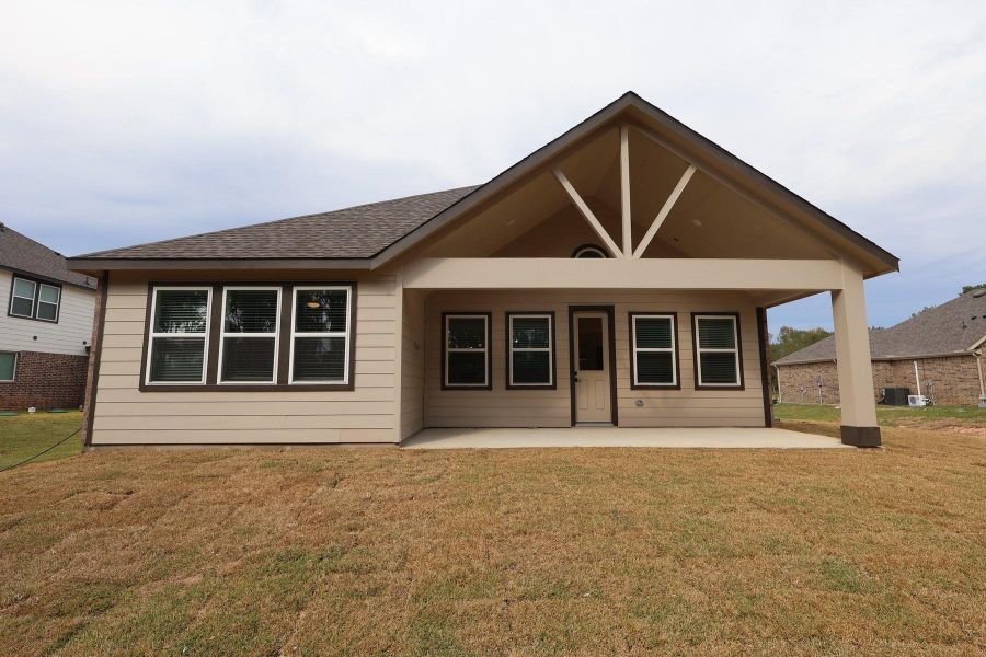 Exterior details and patio area of a home in Tarkington Timbers, Cleveland (Image 3).