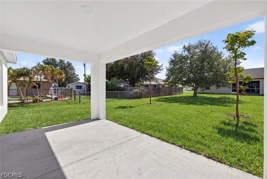 Exterior details and patio area of a home in Cape Coral, Cape Coral (Image 3).