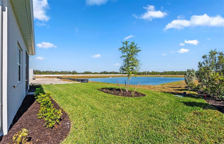 Exterior details and patio area of a home in Shores at Stillwater, Englewood (Image 3).