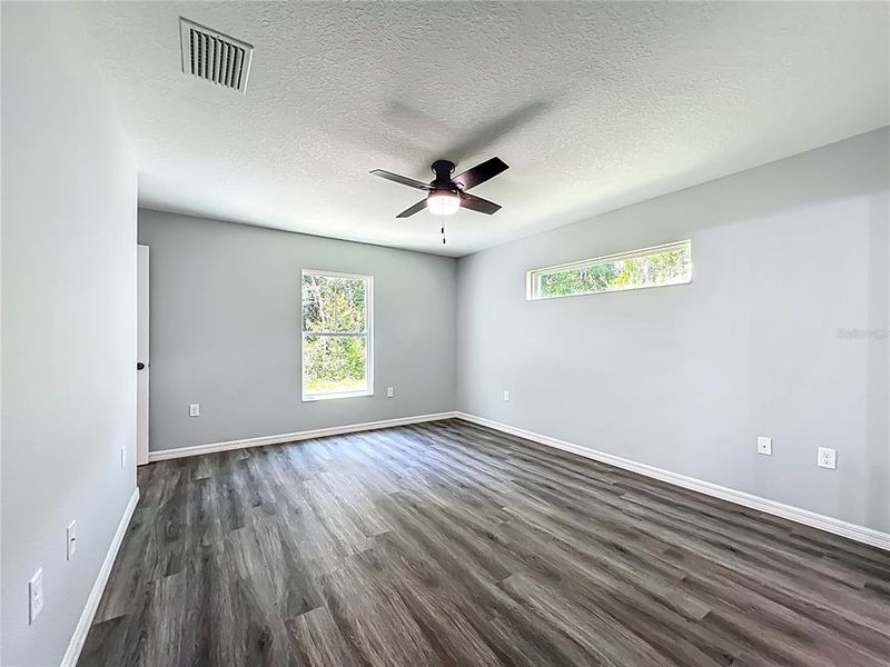 Spacious, unfurnished interior of a new home in , Lake Panasoffkee (Image 17).