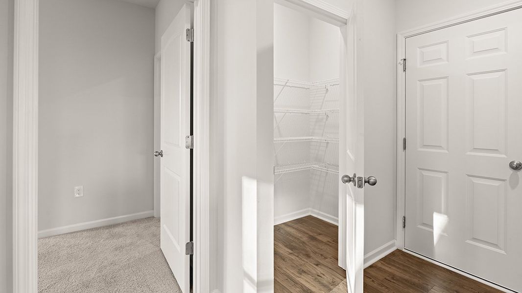 Representative unfurnished interior of a home built from the Mansfield by D.R. Horton in Liberty Crossing, Braselton (Image 18).