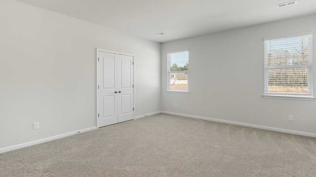 Representative unfurnished interior of a home built from the TILLMAN by D.R. Horton in Surfside Landing, Hubert (Image 28).