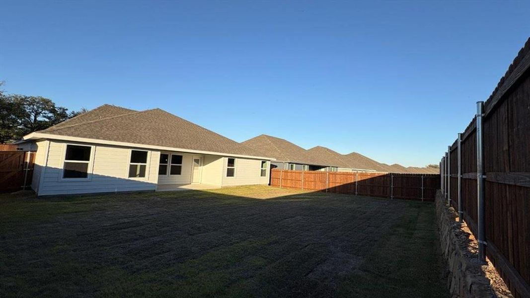 Exterior details and patio area of a home in Sandstone Estates, Granbury (Image 16). Exterior details and patio area of a home in Sandstone Estates, Granbury (Image 16).