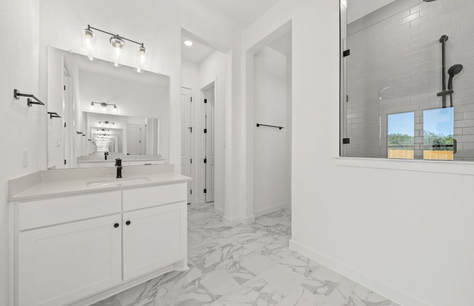 Furnished interior view inside a new home in 6 Creeks, Kyle (Image 8).