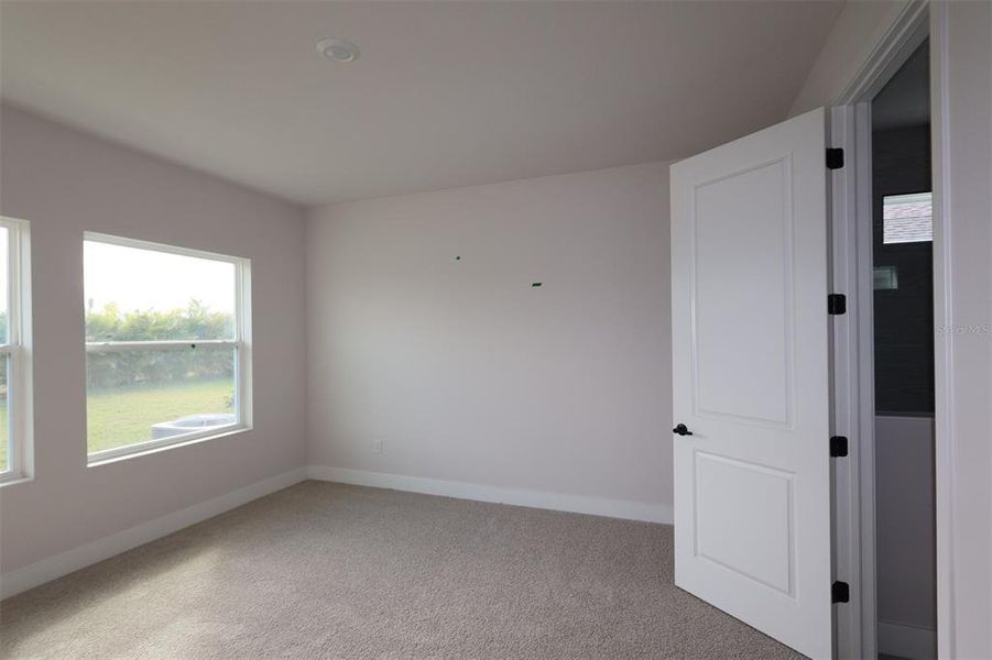 Spacious, unfurnished interior of a new home in Waterset Tradition Series, Apollo Beach (Image 33).