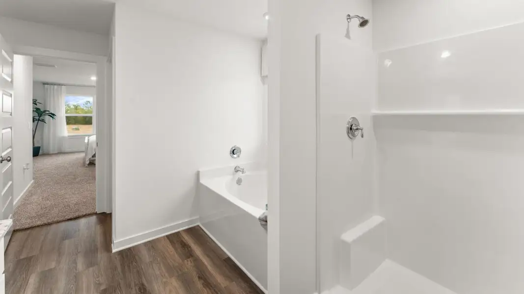 Furnished interior view inside a new home in Magnolia at the Bluffs Phase 3, Freeport (Image 24).