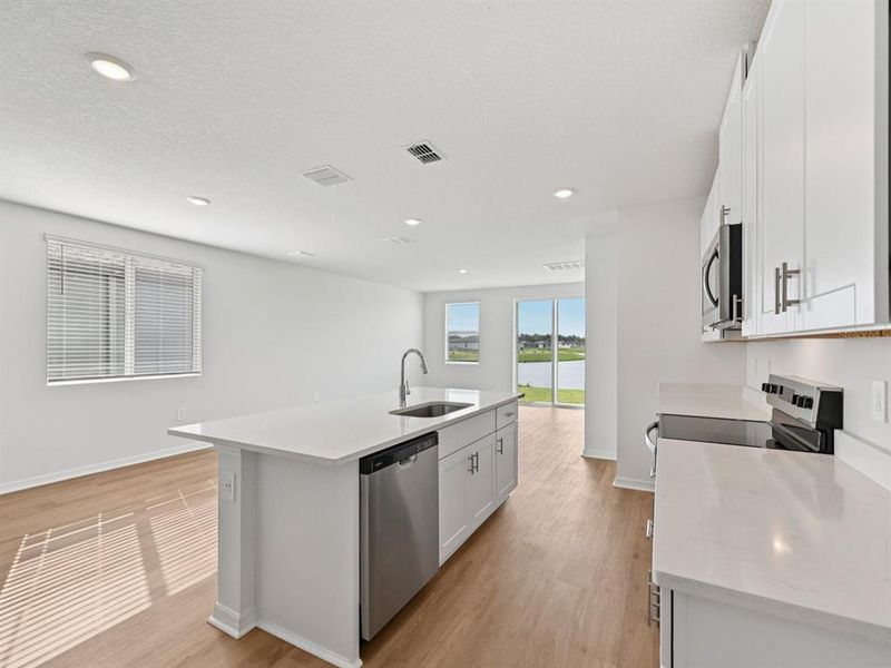 Furnished interior view inside a new home in Oakfield Trails - Premier Series, Parrish (Image 12).