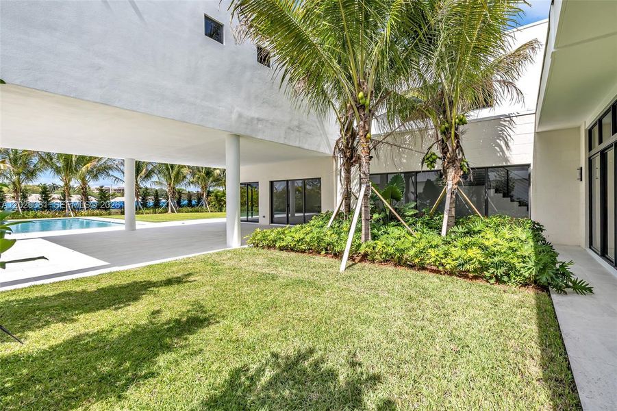 Exterior details and patio area of a home in , Weston (Image 26).