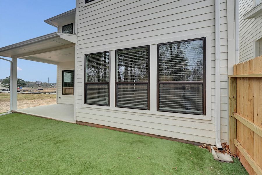 Exterior details and patio area of a home in Summer Place 35', Montgomery (Image 3). Exterior details and patio area of a home in Summer Place 35', Montgomery (Image 3).