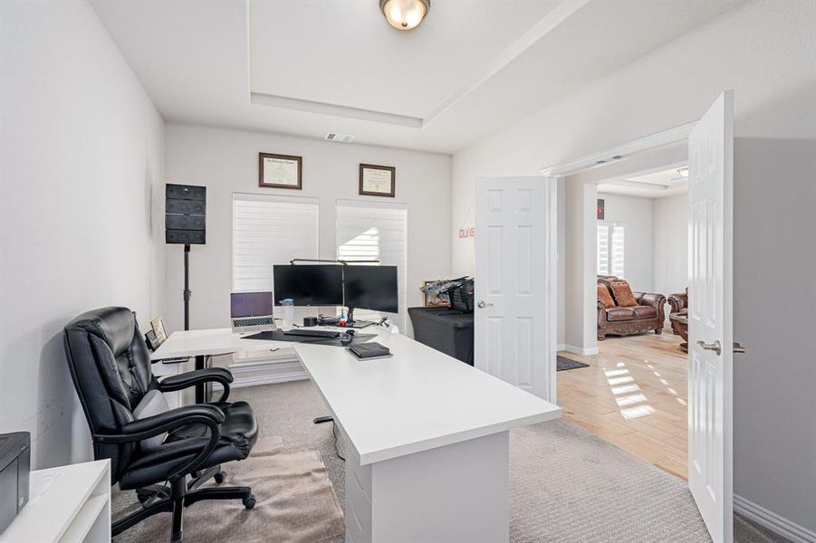 Home office featuring light wood-type flooring