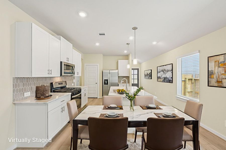 Furnished interior view inside a new home in Sanford Farms - Traditional Series, Waller (Image 2).