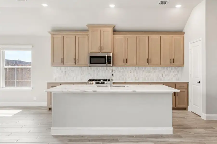 Furnished interior view inside a new home in Devonshire, Forney (Image 10).