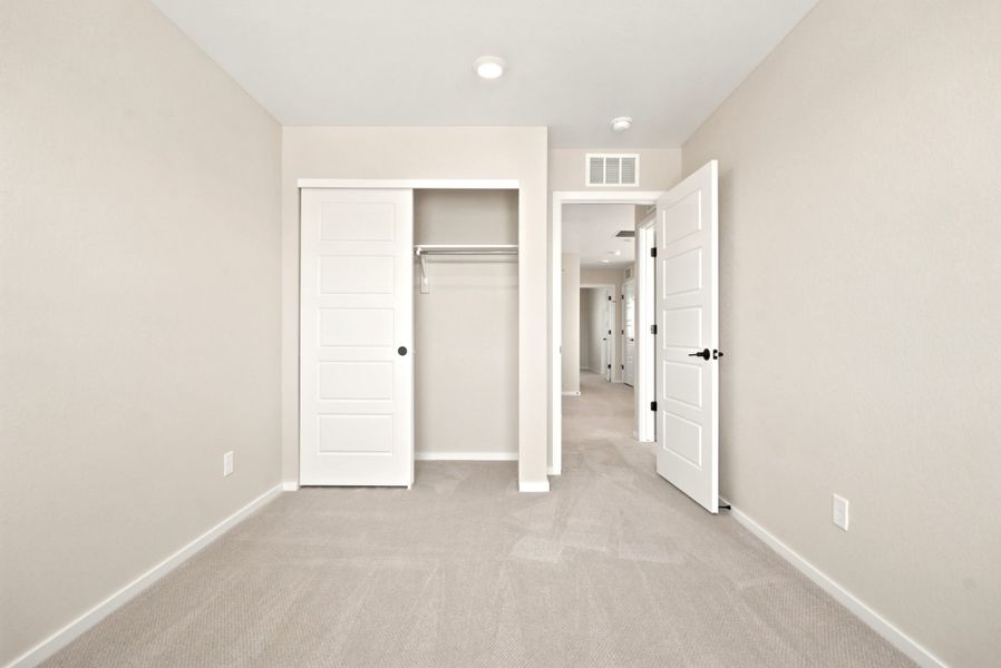 Spacious, unfurnished interior of a new home in Sky Ranch, Watkins (Image 15).