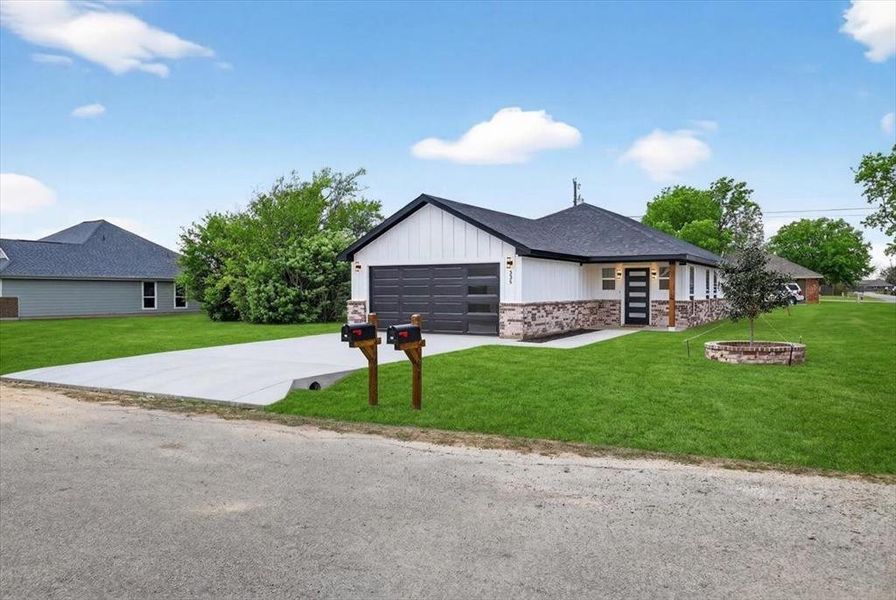 Front exterior of a new home in , Gun Barrel City, TX, highlighting curb appeal (Image 16). Front exterior of a new home in , Gun Barrel City, TX, highlighting curb appeal (Image 16).
