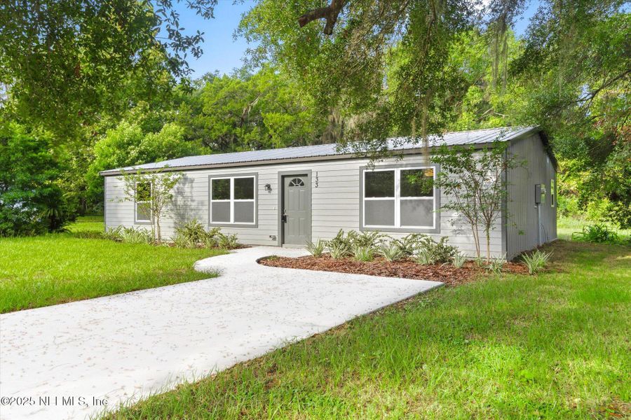 Front exterior of a new home in , Interlachen, FL, highlighting curb appeal (Image 22).