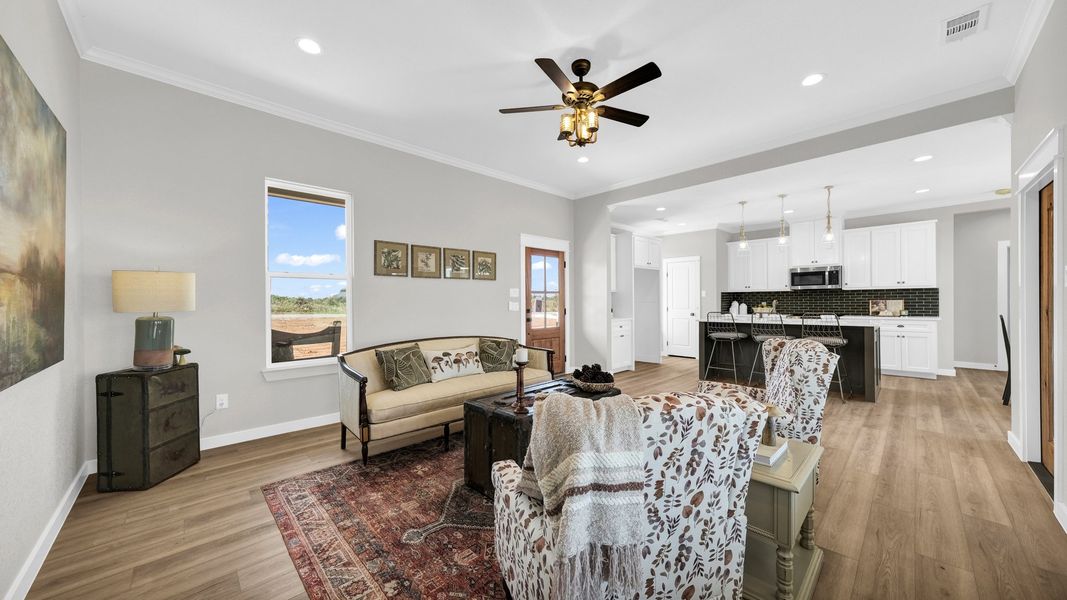 Representative furnished interior of a home built from the Loretta by Zeal Home Builders in Parallel Pastures, Poolville (Image 9).