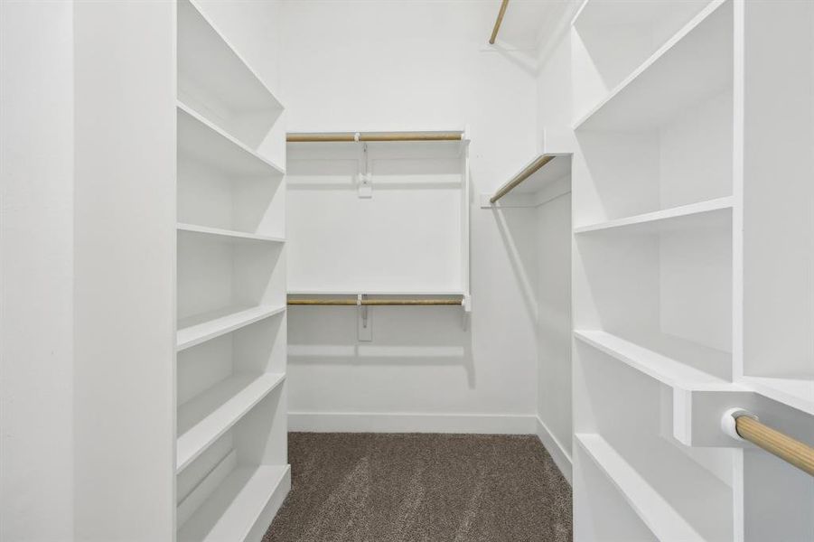 Spacious walk in master closet