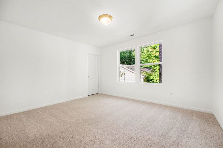 Spacious, unfurnished interior of a new home in Lake Royale, Louisburg (Image 17).