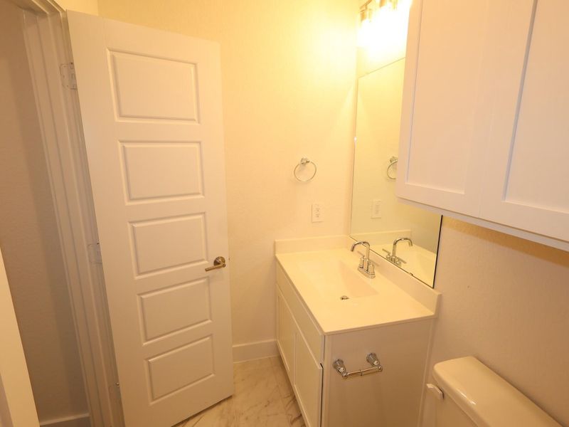 Furnished interior view inside a new home in Sorella, Tomball (Image 10).