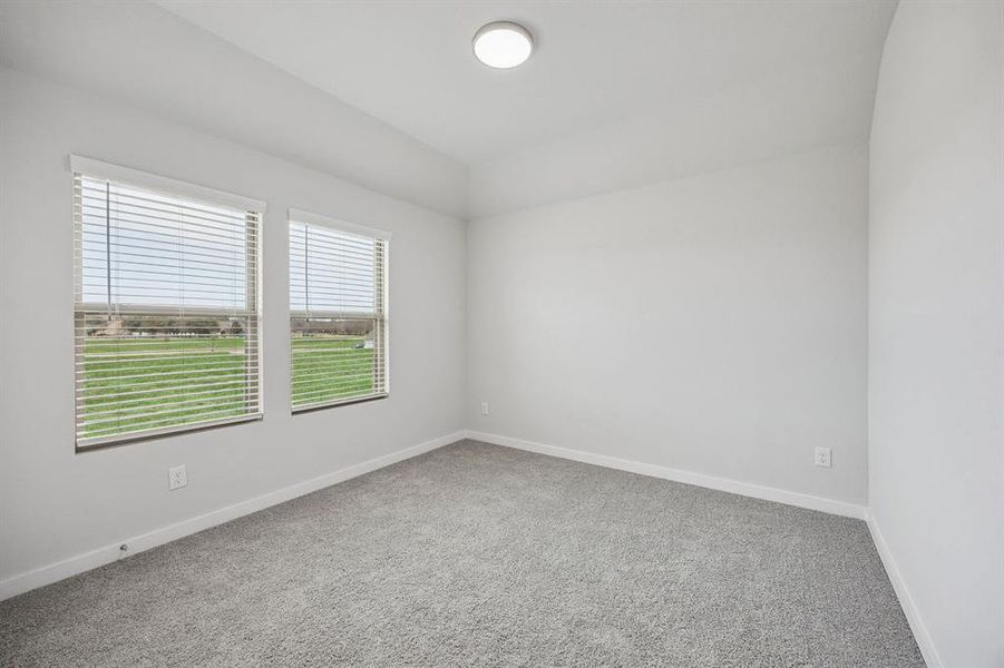 Bedroom in the Masters home plan by Trophy Signature Homes – REPRESENTATIVE PHOTO