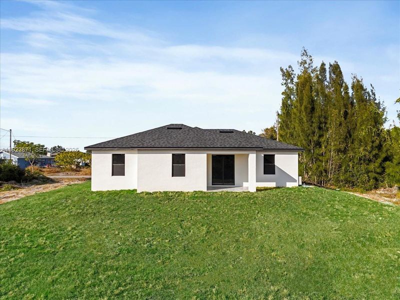 Exterior details and patio area of a home in , Lehigh Acres (Image 3).