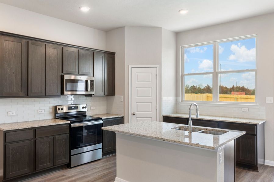 Representative furnished interior of a home built from the The 1475 by Stylecraft Builders in Arroyo Ranch, Seguin (Image 6).