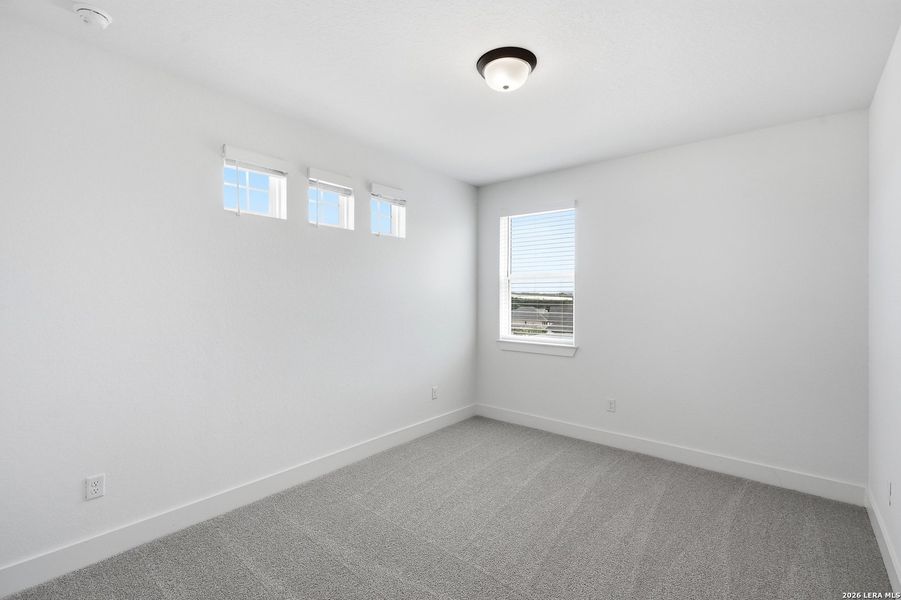 Spacious, unfurnished interior of a new home in The Reserve at Potranco Oaks, Castroville (Image 20).
