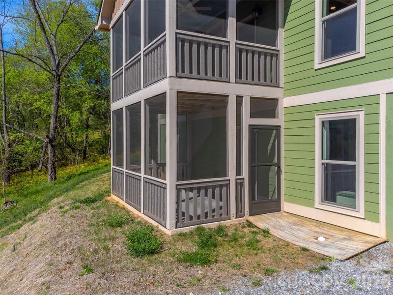 Exterior details and patio area of a home in , Waynesville (Image 29).